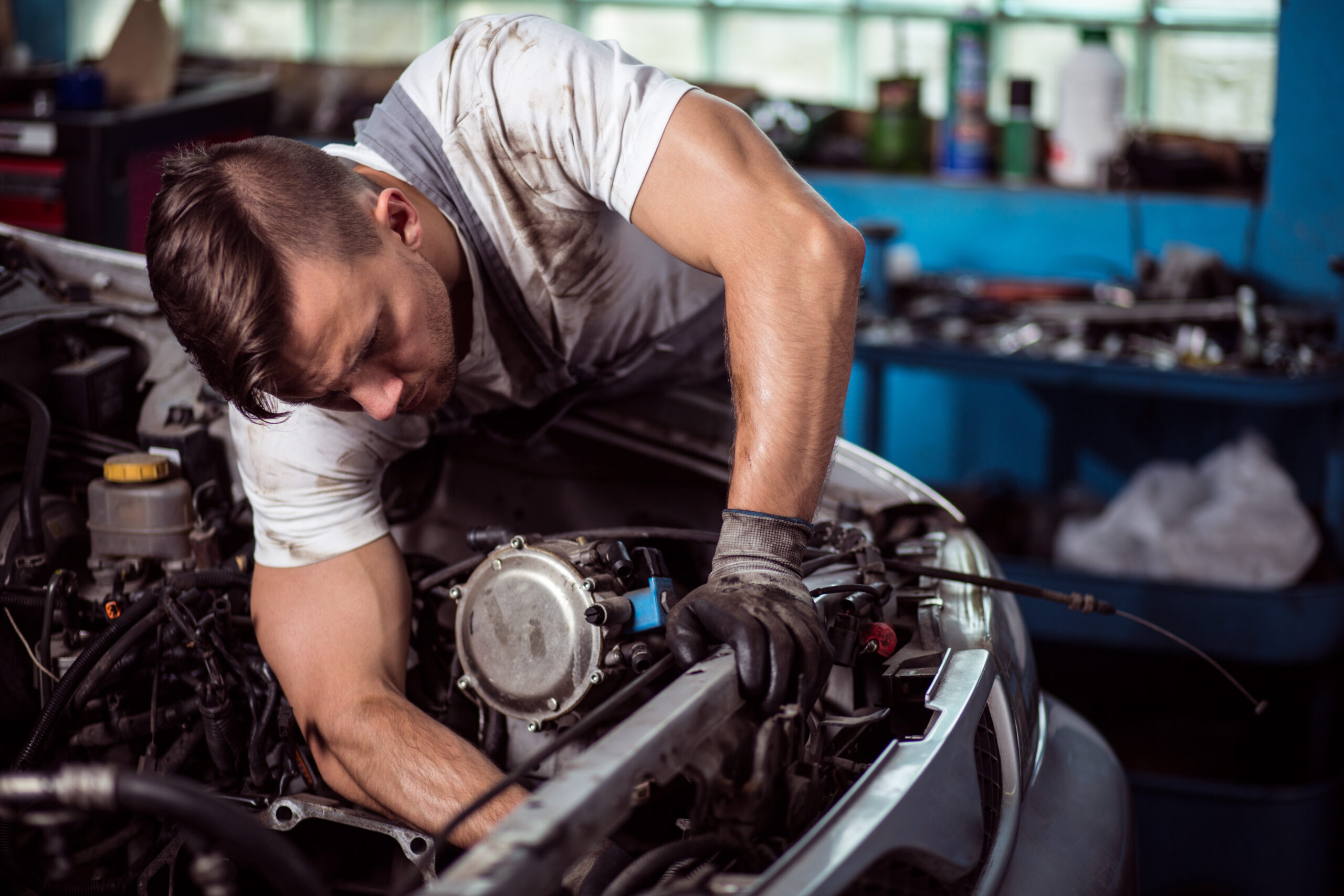 Mechanic repairing car